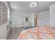 Bright bedroom with a dresser, bedside table, and ample natural light at 11120 Pagebrook Ln, Charlotte, NC 28214