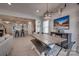Open dining area and kitchen featuring a large table, casual seating, and modern fixtures at 11120 Pagebrook Ln, Charlotte, NC 28214