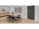 Modern dining room featuring sleek furnishings and contemporary decor, including decorative wall art at 1300 Queens Rd # 408, Charlotte, NC 28207