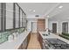 Well-designed kitchen with modern appliances, sleek countertops, and island with sink at 1300 Queens Rd # 408, Charlotte, NC 28207