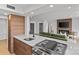 Open concept kitchen flows into a cozy living room, perfect for entertaining at 1300 Queens Rd # 408, Charlotte, NC 28207