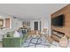 Spacious living room boasts a fireplace, hardwood floors, and modern finishes at 1300 Queens Rd # 408, Charlotte, NC 28207