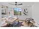 A well-lit home office features built-in shelving, a sleek desk, and a large window at 1300 Queens Rd # 408, Charlotte, NC 28207