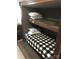 This is a bunk room with a carpeted floor and overhead storage at 137 Landlubber Trl, Mount Gilead, NC 27306
