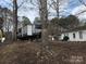 RV and small building surrounded by trees at 137 Landlubber Trl, Mount Gilead, NC 27306
