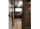 Hallway view of a bunk room with a window to the right at 137 Landlubber Trl, Mount Gilead, NC 27306