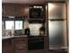 RV kitchen with appliances and fixtures at 137 Landlubber Trl, Mount Gilead, NC 27306