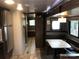Comfortable RV living room and kitchen area at 137 Landlubber Trl, Mount Gilead, NC 27306