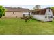 Enjoy the great outdoors in this well-maintained backyard with a storage building and deck at 1401 Birch St, Kannapolis, NC 28081