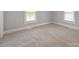 Bedroom featuring carpet, neutral paint, and natural light at 1401 Birch St, Kannapolis, NC 28081