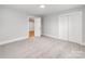 This bedroom is roomy with carpet and a large closet at 1401 Birch St, Kannapolis, NC 28081
