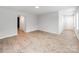 Spacious living room with wood floors and ample natural light from large windows at 1401 Birch St, Kannapolis, NC 28081