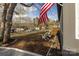 Charming home with a well-maintained front yard and a flag at 167 Holly Harbor Trl # 169/170, Mount Gilead, NC 27306