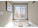 Bright bathtub with window, stylish faucets, and decorative elements at 2016 Monaghan Ct, Matthews, NC 28105
