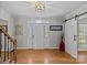 Charming foyer featuring hardwood floors, barn door, and modern decor elements, creating a stylish ambiance at 2016 Monaghan Ct, Matthews, NC 28105