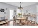 Bright dining area with a round table, stylish chairs, and elegant decor, perfect for Gathering meals at 2019 Taylorcrest Dr, Fort Mill, SC 29715