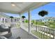 Inviting front porch with gray floors, white railings and posts, ceiling fan, and neighborhood views at 2019 Taylorcrest Dr, Fort Mill, SC 29715