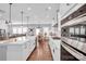 Beautiful kitchen features an island with a farmhouse sink, stainless steel appliances, and an open concept design at 2019 Taylorcrest Dr, Fort Mill, SC 29715