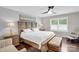 Main bedroom with bed, side tables, and a bench at 2019 Taylorcrest Dr, Fort Mill, SC 29715