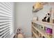 Playroom area features a window with blinds, a bookshelf, and cozy stuffed animals making the space more inviting at 2019 Taylorcrest Dr, Fort Mill, SC 29715