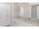 Bathroom with double sink vanity and shower behind glass door, next to enclosed toilet at 2052 Harlequin Dr, Indian Trail, NC 28079
