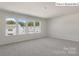 Large bright bedroom with several windows at 2052 Harlequin Dr, Indian Trail, NC 28079
