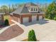 Large detached garage with four bays and ample parking space at 2236 Tuckaway Rd, Rock Hill, SC 29730