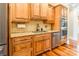 View of a kitchen area with custom wood cabinetry, granite countertops, and stainless steel appliances at 2236 Tuckaway Rd, Rock Hill, SC 29730