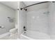 Updated bathroom with a white subway tile shower and tub combo, plus a modern toilet at 232 Cromer St, Charlotte, NC 28208