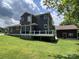 Charming two-story home with a spacious backyard and detached garage; idyllic setting at 232 Cromer St, Charlotte, NC 28208