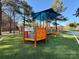 Inclusive playground equipment with accessible sign language feature under a shade canopy at 232 Cromer St, Charlotte, NC 28208