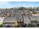 Aerial view showcasing townhomes with Charlotte skyline in the background, on a clear day at 2446 Alyssa Ln, Charlotte, NC 28208
