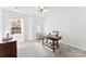 Bedroom with a ceiling fan, large windows, and modern decor at 2446 Alyssa Ln, Charlotte, NC 28208