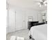 Bright bedroom space boasting white doors, neutral walls, carpet and dark wood accents that provide comfort at 2446 Alyssa Ln, Charlotte, NC 28208