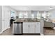 Stylish kitchen features granite counters, stainless steel dishwasher, and mosaic backsplash at 2446 Alyssa Ln, Charlotte, NC 28208