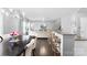 Open floor plan features a spacious dining area with bar seating, perfect for entertaining at 2446 Alyssa Ln, Charlotte, NC 28208