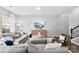 Bright and inviting living room area with sectional sofa and a TV at 2446 Alyssa Ln, Charlotte, NC 28208
