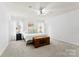 Bright main bedroom with a ceiling fan and plenty of natural light at 2446 Alyssa Ln, Charlotte, NC 28208