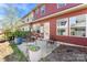 Inviting outdoor patio featuring stylish chairs and tables that is ideal for entertaining or relaxing outside at 2446 Alyssa Ln, Charlotte, NC 28208