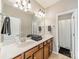 Bathroom featuring double sink vanity, a large mirror, and well-lit space at 2616 Creek Manor Dr, Waxhaw, NC 28173
