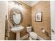 Charming half-bathroom with unique wallpaper and decorative mirror at 2616 Creek Manor Dr, Waxhaw, NC 28173