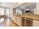 Well-appointed kitchen featuring granite countertops, stainless steel appliances, and an open view to the living room at 2616 Creek Manor Dr, Waxhaw, NC 28173