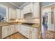 Modern kitchen features white cabinets, granite countertops, and stainless steel appliances at 2616 Creek Manor Dr, Waxhaw, NC 28173