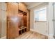 Mudroom featuring built-in wooden cabinets and bench seating at 2616 Creek Manor Dr, Waxhaw, NC 28173