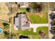 Charming home with a long driveway, landscaped yard, outdoor firepit, and fenced backyard with a pool and playset at 282 W Shiloh Unity Rd, Lancaster, SC 29720