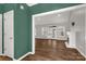Open-concept living room boasts hardwood floors, a fireplace, and plenty of natural light at 282 W Shiloh Unity Rd, Lancaster, SC 29720