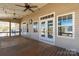 Screened-in porch has a wooden ceiling and floor and offers an area to relax outdoors at 282 W Shiloh Unity Rd, Lancaster, SC 29720