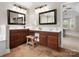 Dual vanity bathroom with dark cabinetry, tile floor, and plenty of lighting at 3100 Stanway Ct, Waxhaw, NC 28173