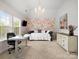 Bright bedroom with elegant wallpaper and modern furnishings at 3100 Stanway Ct, Waxhaw, NC 28173