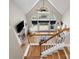 Overhead view of living room with stone fireplace and ample natural light at 3100 Stanway Ct, Waxhaw, NC 28173